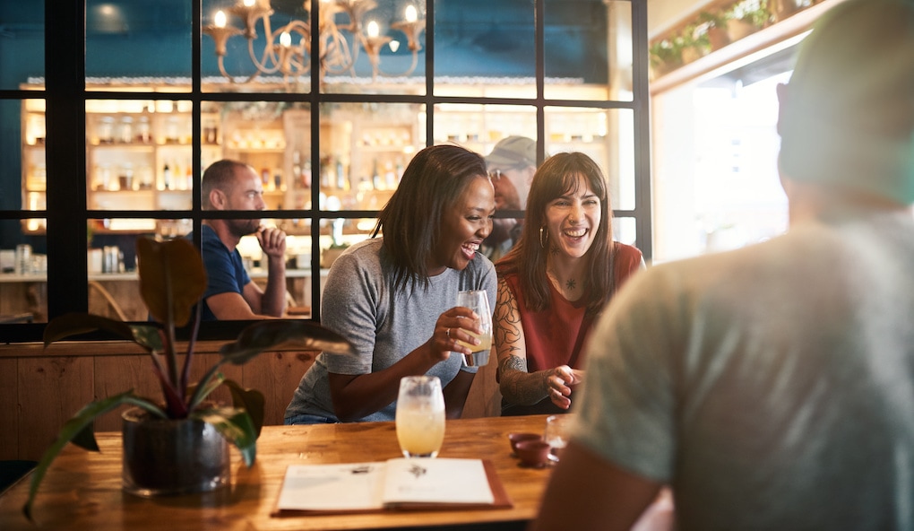 friends laughing at one of the restaurants in sudbury